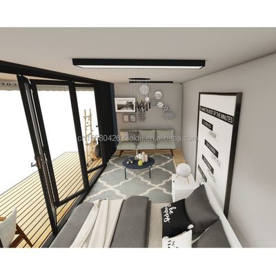 ログ 20フィート 環境に優しいフラットパック コンテナハウス プリファブリック 持続可能な建設 鉄筋構造 耐雨 風 雪店