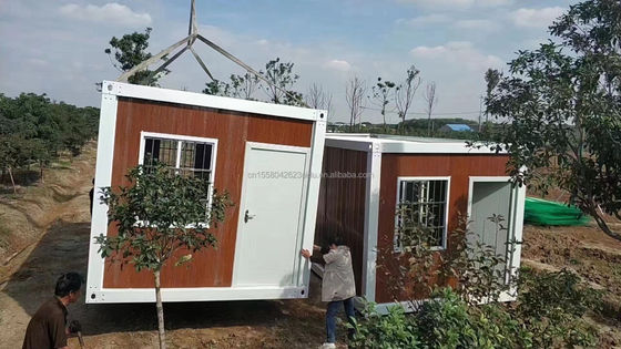 建築現場の移住労働者のためのカスタマイズされた色 20フィート プリファブリックフラットパッケージ 卸貨コンテナ フレームハウス
