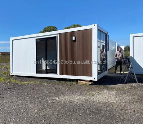 ホテル コンテナハウス フラットパッケージング 迅速な家庭建設 鋼筋枠 鋳造 折りたたみ 180g 高級 木造家